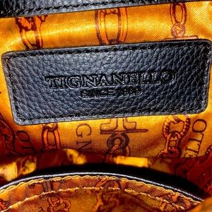 Tignanello black leather purse.